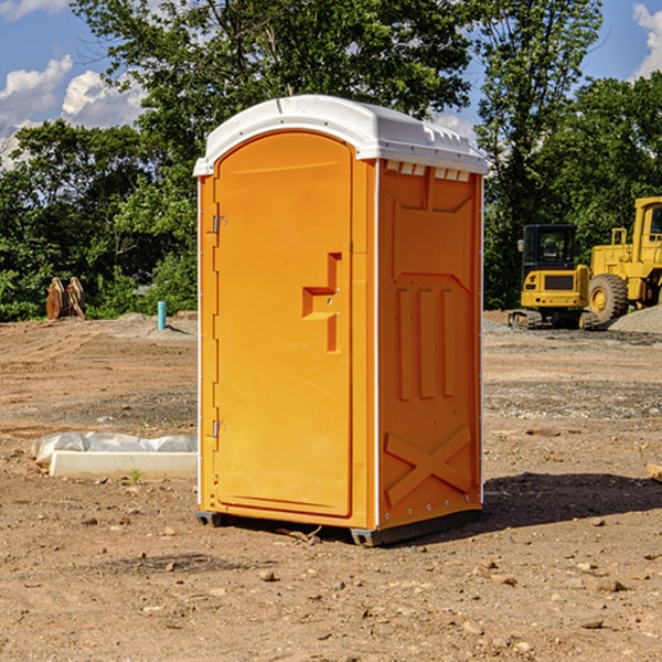 how often are the porta potties cleaned and serviced during a rental period in Bond